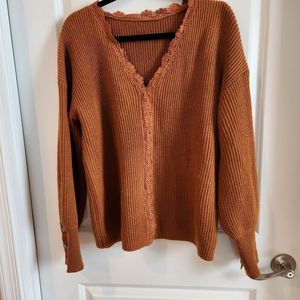Brown large sweater with buttons detail on sleeves